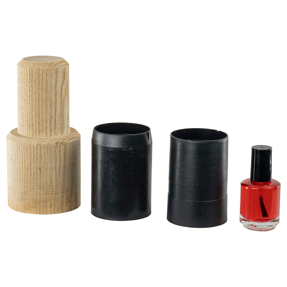 Springfield Spring-Lock Base Repair Kit with thin and thick bushings, glue bottle, and wooden dowel mandrel